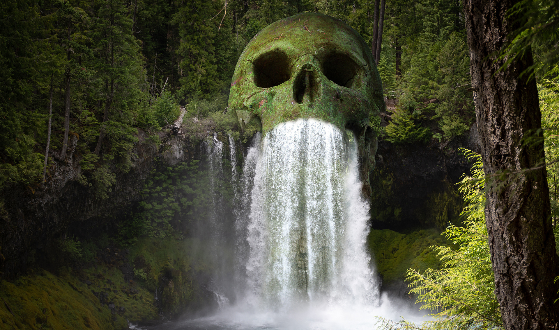 EXT. SKULL WATERFALL – DAY