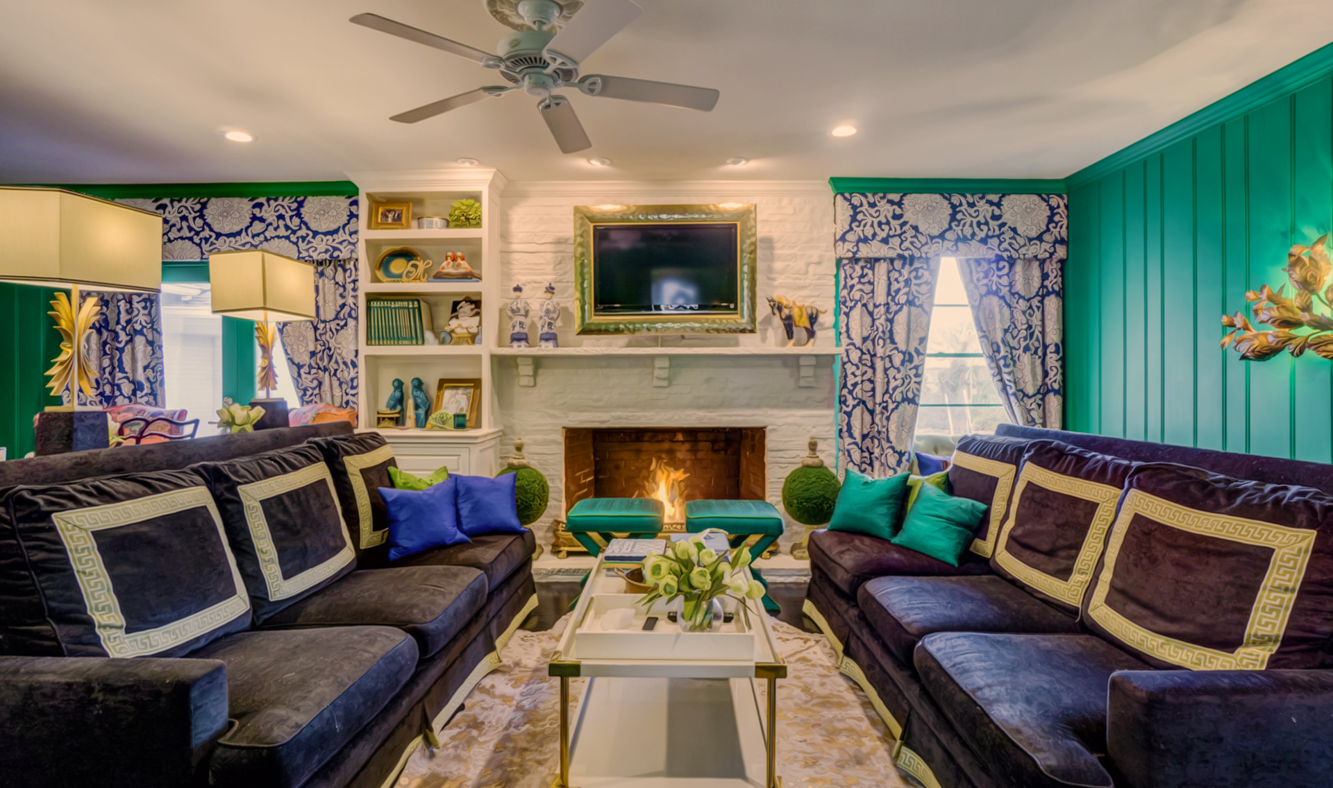 INT. BLUE GREEN LIVING ROOM – DAY